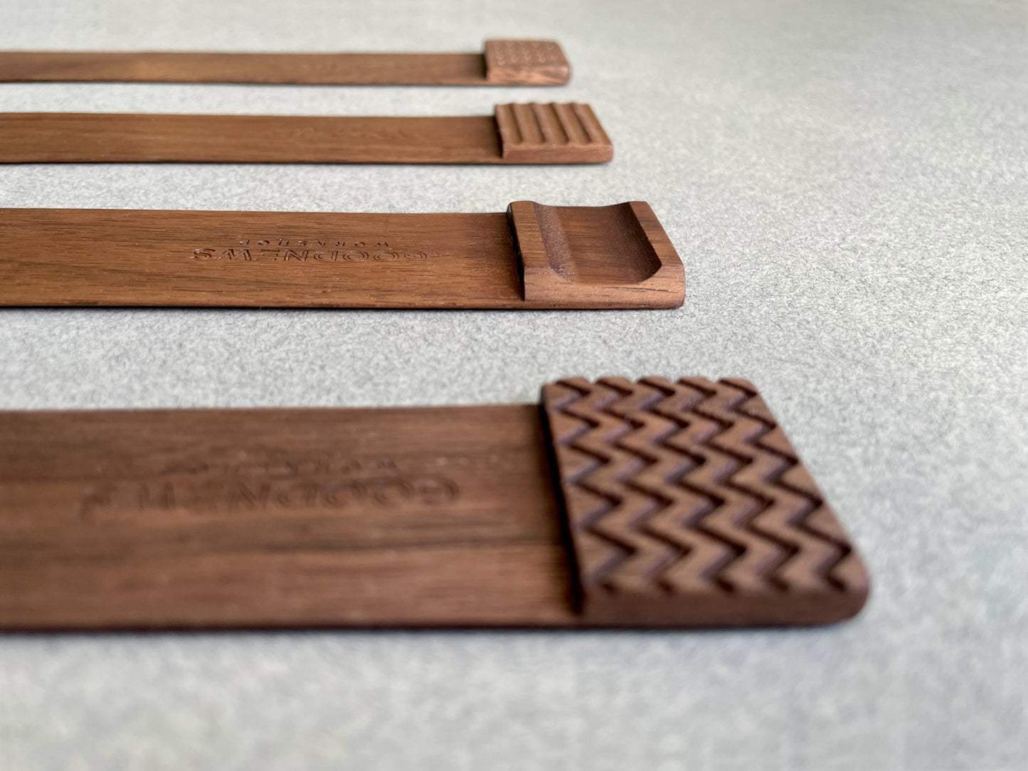 Edge Bookmark alternate detail view of engraving from side of each of the four designs