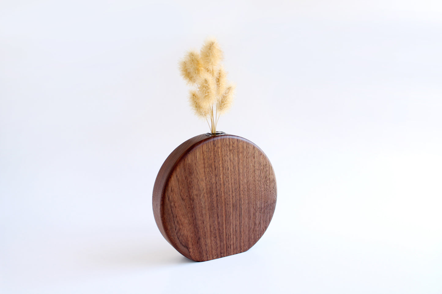 Walnut Circle Vase with Test tube for wet or dry flowers. Dried flowers shown in vase. Back View