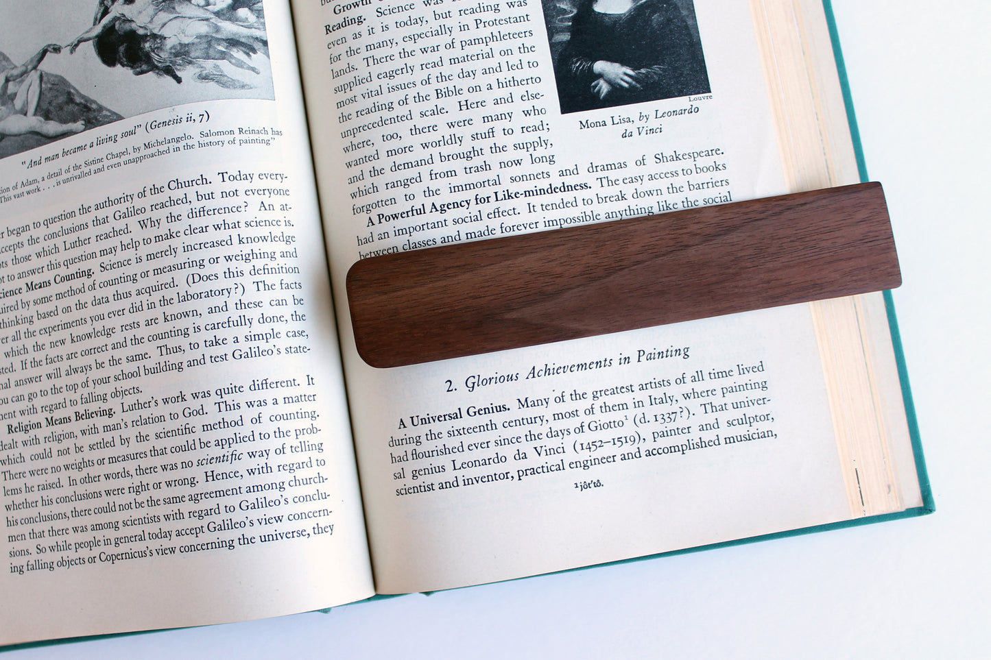Detail view of bookmark sliding down page to underline or follow page while reading.