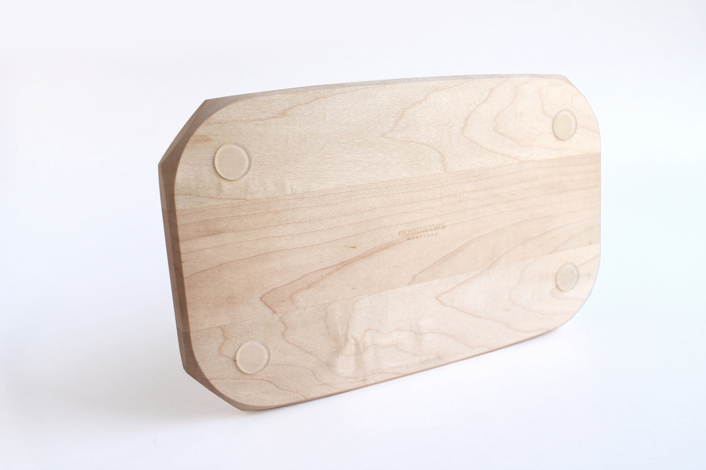 Genesis Tray in Maple wood on white background. Bottom view showing non slip feet and stamped Goodnews Workshop logo.