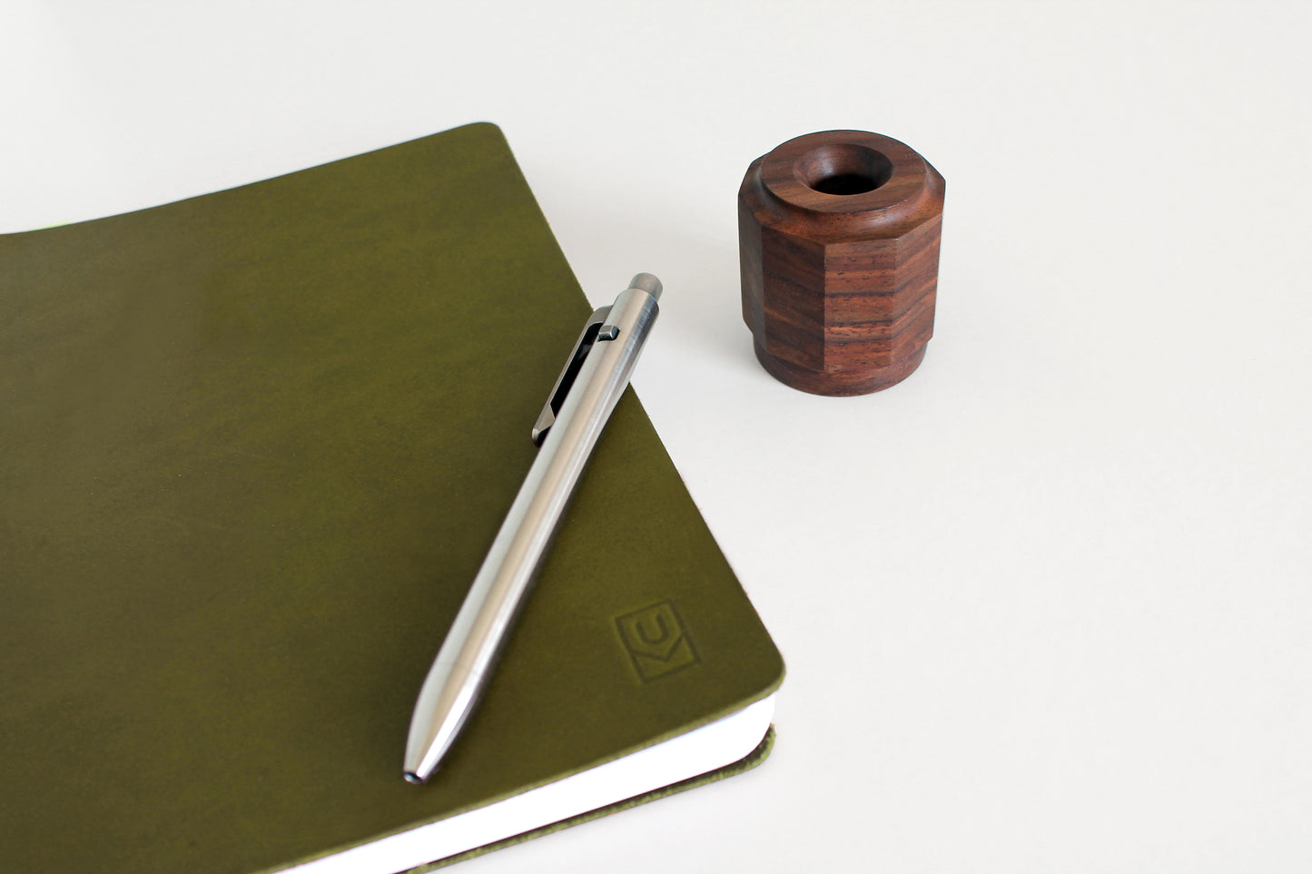 Walnut pen holder with titanium pen and leather journal